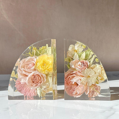 Wedding bouquet flowers preserved in clear resin bookends