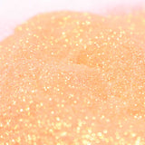 Fine light orange glitter