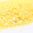 Flaky pale yellow glitter