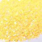 Flaky pale yellow glitter