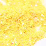 Flaky pale yellow glitter